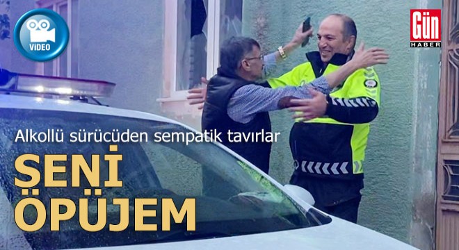 Alkollü sürücü polise sarılıp bayramlaştı