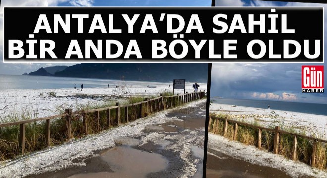Antalya da kumların beyaza büründüğünü gören sahile koştu