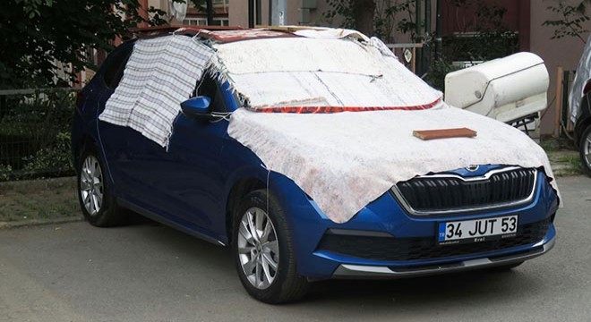 Araç sahiplerinin kilimli battaniyeli dolu önlemi