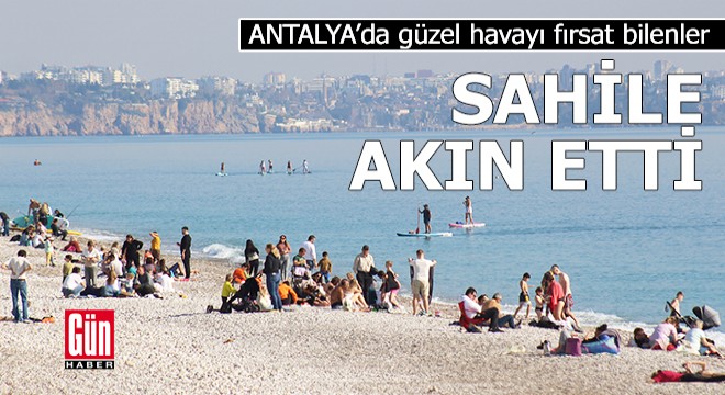 Antalya'da güzel havayı fırsat bilenler sahile akın ettı