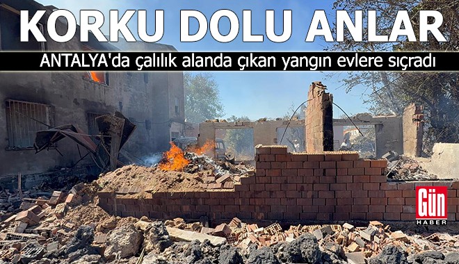 Antalya'da çalılık alanda çıkan yangın evlere sıçradı