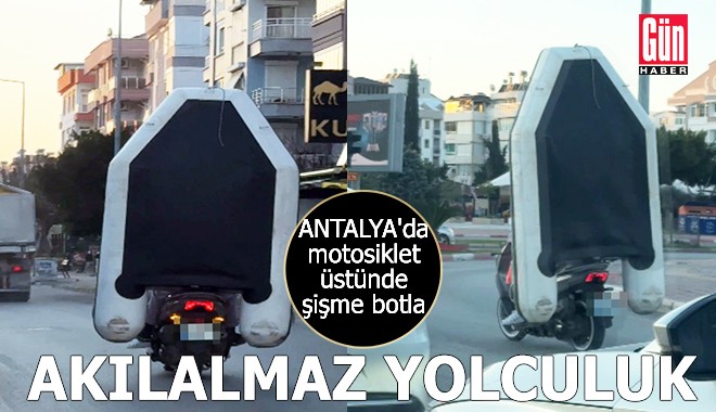 Antalya'da motosiklet üstünde şişme botla akılalmaz yolculuk