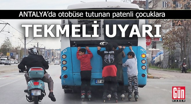 Antalya da otobüse tutunan patenli çocuklara  tekmeli  uyarı