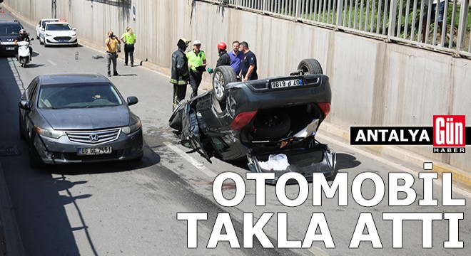 Antalya da otomobil alt geçitte takla attı