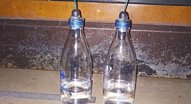 Boşanmak isteyen eşe silahlı molotoflu tehdit