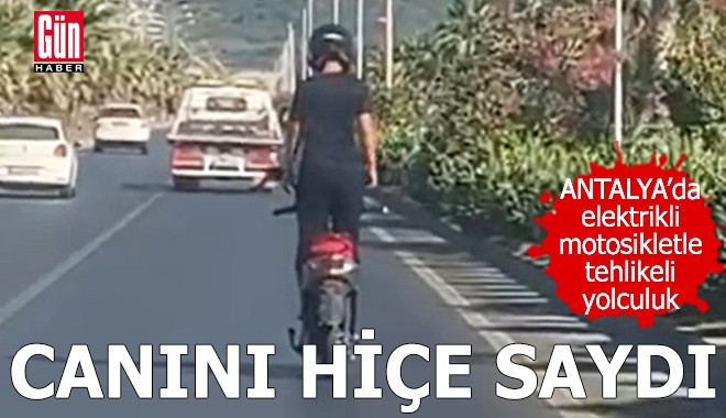 Canını hiçe saydı! Antalya'da tehlikeli yolculuk