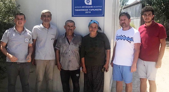 Evi yanan aileye Büyükşehir'den yardım