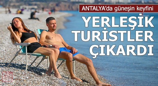 Güneşin keyfini yerleşik turistler çıkarttı