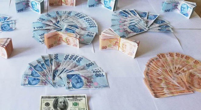 Güvenlik korucusu ve 3 kişi sahte parayla yakalandı