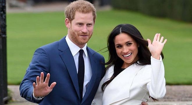 Harry ve Markle yardım dağıtırken güvenlik kamerasına takıldı