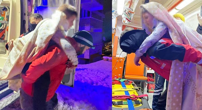 Hasta çocuğu karlı yolda sırtında taşıyan hemşireye ödül
