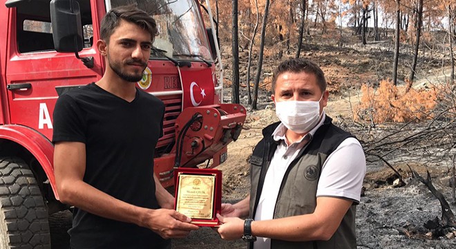 İki kardeşe, yangındaki çabaları için plaket