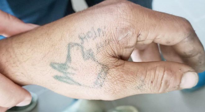Kablo hırsızını 'kurt kafası' dövmesi yakalattı