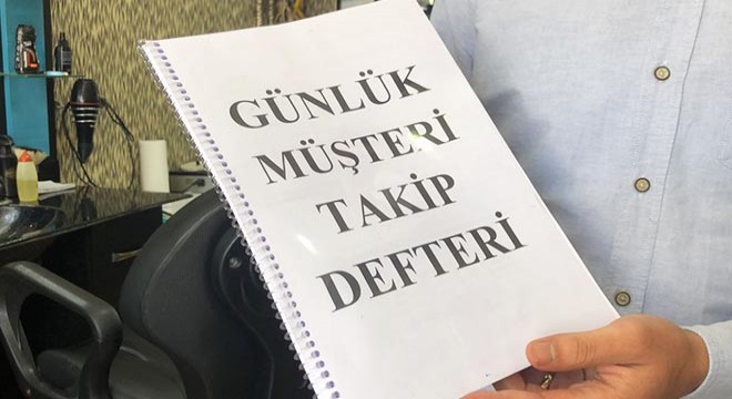 Kars'ta berberler, 'müşteri kayıt defteri' tutuyor