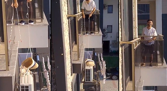 Klima ünitesinde mahsur kalan kediyi plaj çantasıyla kurtardı