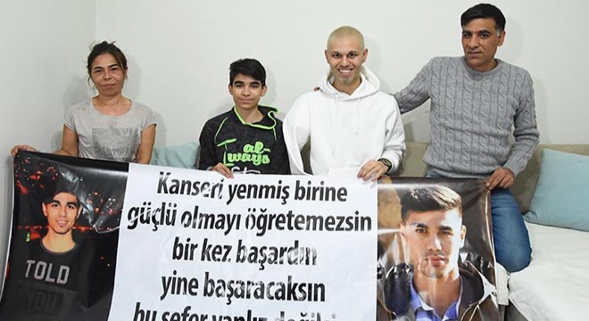 Kolu kesilen Adil'e, pankartlı ve tezahüratlı karşılama