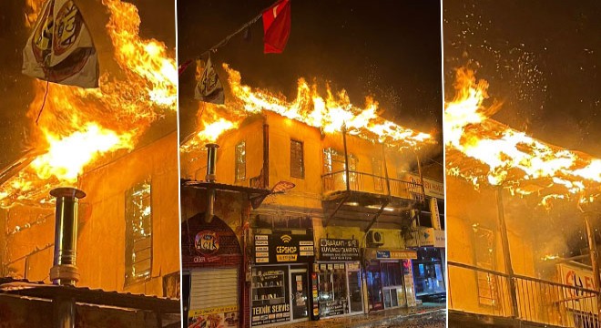 Kozan'da iki katlı binada çıkan yangın hasara neden oldu
