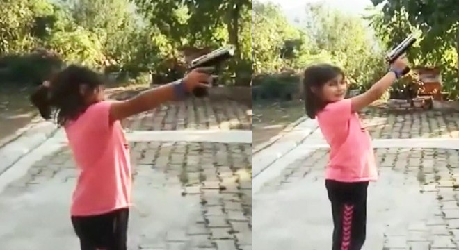 Küçük kıza zorla ateş ettirdi, vurulma tehlikesi atlattı