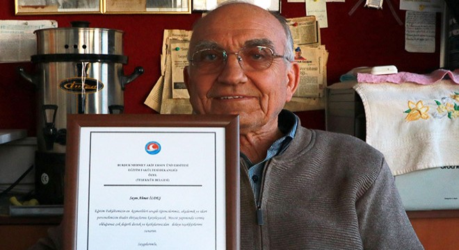 MAKÜ den Ahmet İldeş e plaket