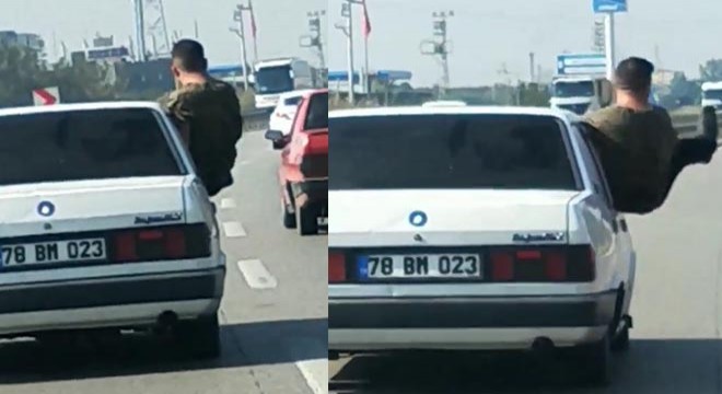 Otomobilden sarkıp, tehlikeli hareketler yaptı