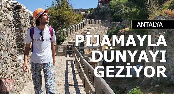Otostop çekip, pijamayla dünyayı geziyor