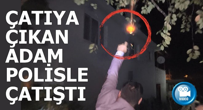 Polis çatıya kaçan adamla çatıştı