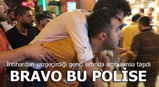 Polis intihardan vazgeçirdiği genci sırtında taşıdı