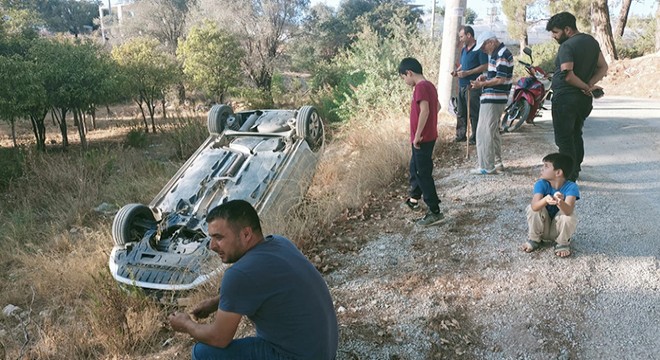 Takla atan araçtan burnu kanamadan çıktı