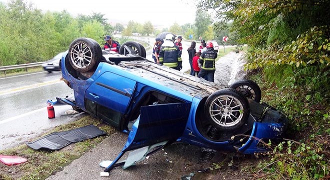 Takla atan otomobilden yara almadan kurtuldular