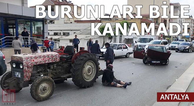 Traktörden asfalta düştüler, burunları bile kanamadı