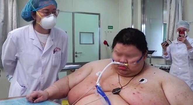 Vuhan'da karantinada 102 kilo aldı