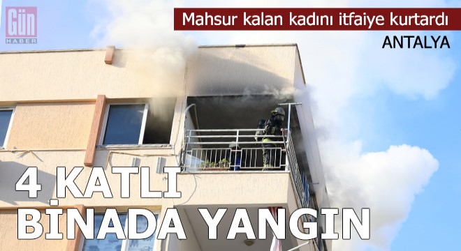 Yangında balkonda mahsur kalan kadını itfaiye kurtardı
