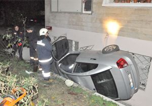 Otomobiliyle bahçeye uçtu
