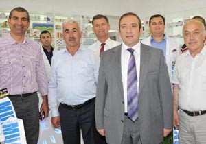 Protokol eczane açılışında buluştu