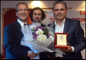 Uysal’a teşekkür plaketi
