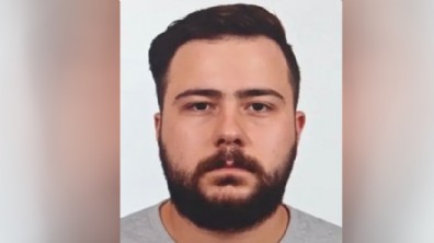 Konserde fenalaşıp ölen bankacı, toprağa verildi