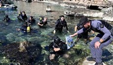 Antalya'da deniz temizliğinde, 2 bisiklet ve 1 tabanca bulundu