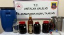Antalya'da evinde sahte içkiyle yakalandı