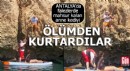 Antalya'da falezlerde mahsur kalan anne kediyi kurtardılar