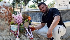 Başpehlivanlık ünvanını kazandı, babasının mezarını ziyaret etti