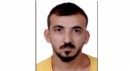 Eşiyle ilişkisi olduğunu öne sürdüğü kişiyi öldürüp kaçtı