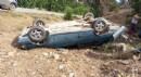 Otomobil şarampole yuvarlandı