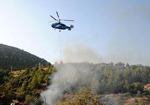 Kumluca'da ev ve makilik yangını